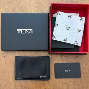 TUMI Black Leather Wallet